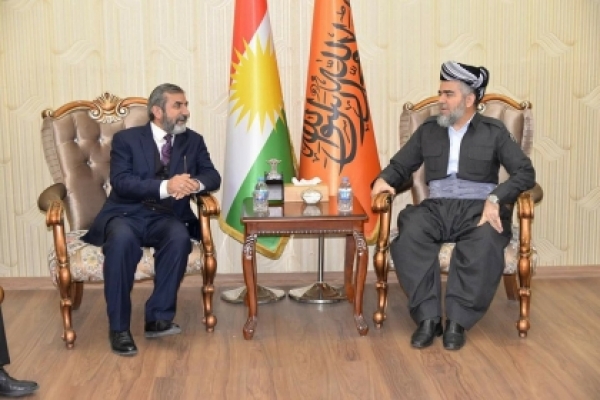 A high-level delegation of the Kurdistan Islamic Union visits the Islamic Group