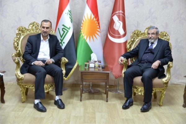 Secretary-General of the Kurdistan Islamic Union receives a delegation from the Hana Charitable Organization